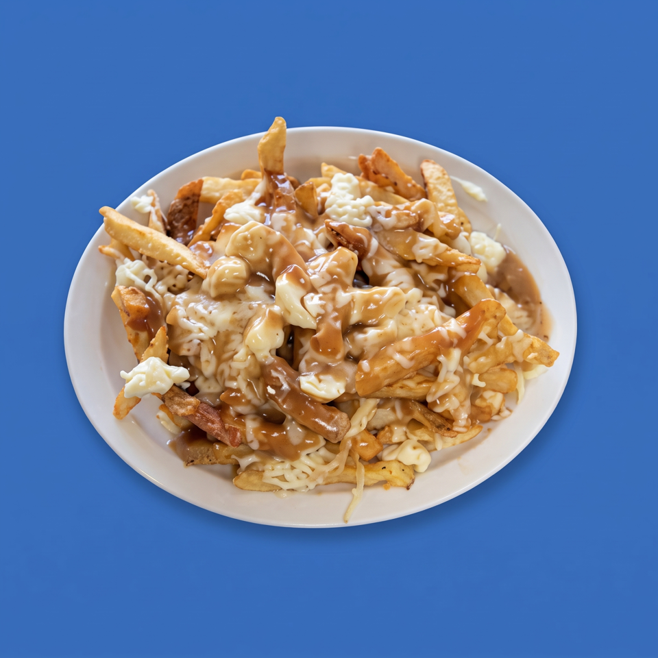 Plate of golden fries topped with melted cheese curds and brown gravy against a blue background.